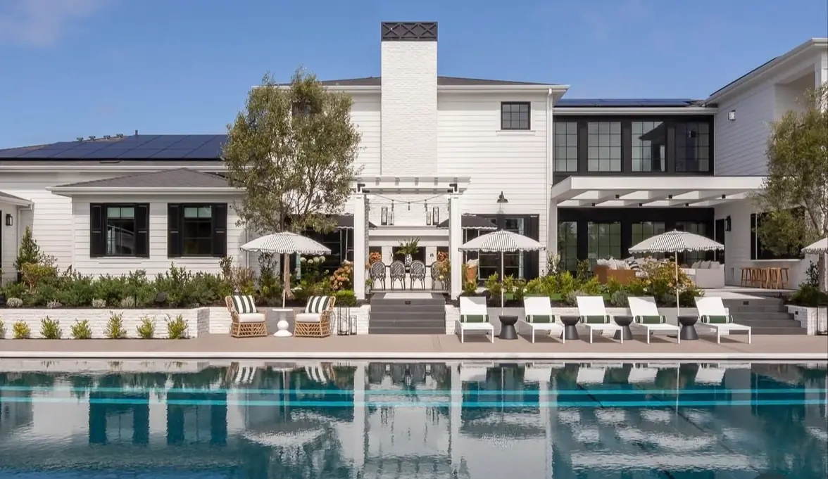 Happy homeowners enjoying a beautifully landscaped outdoor space