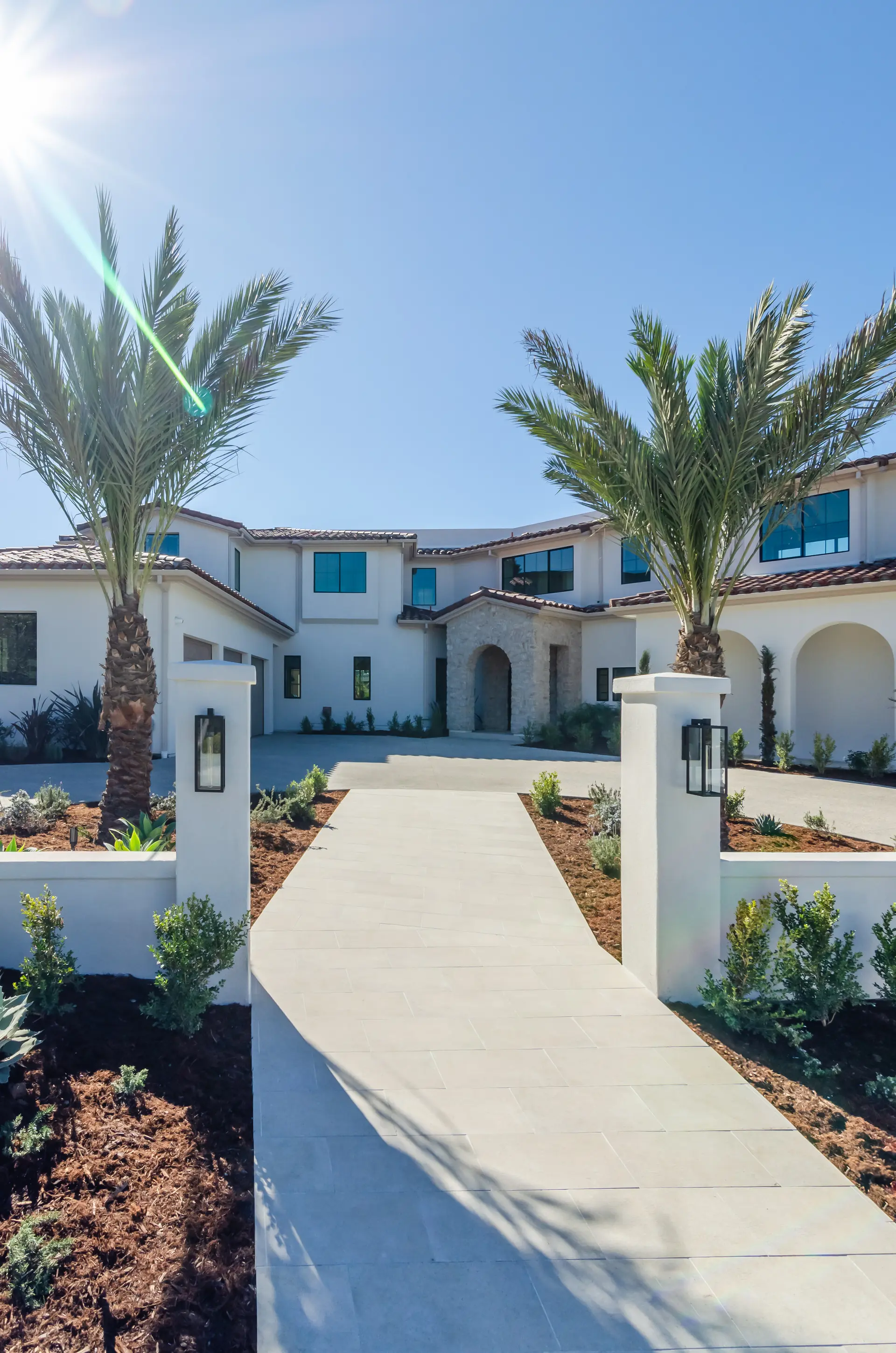 Luxury home with landscaped exterior