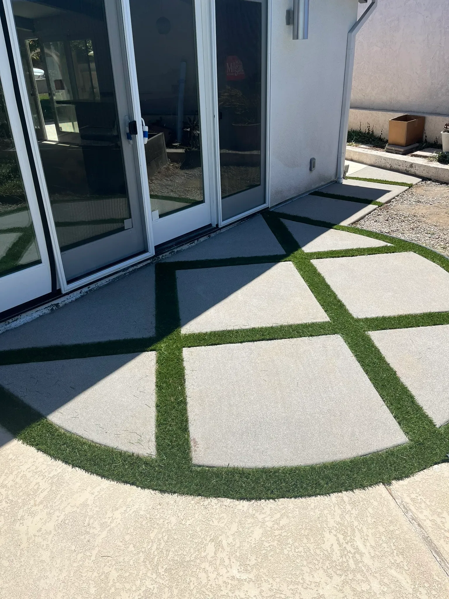 Outdoor kitchen with grill, counter space, and bar seating