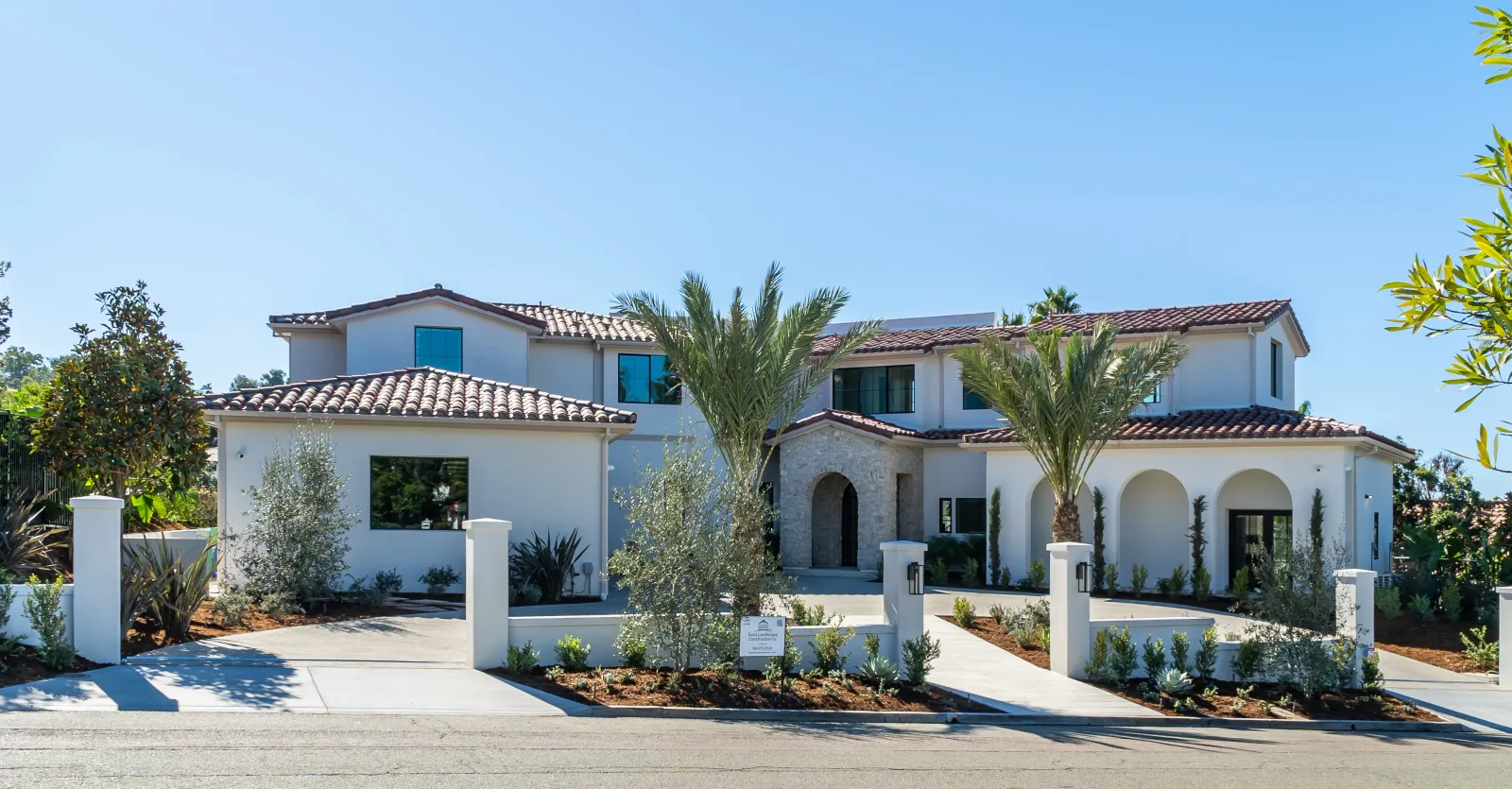 Concrete driveway and patio work with clean finish